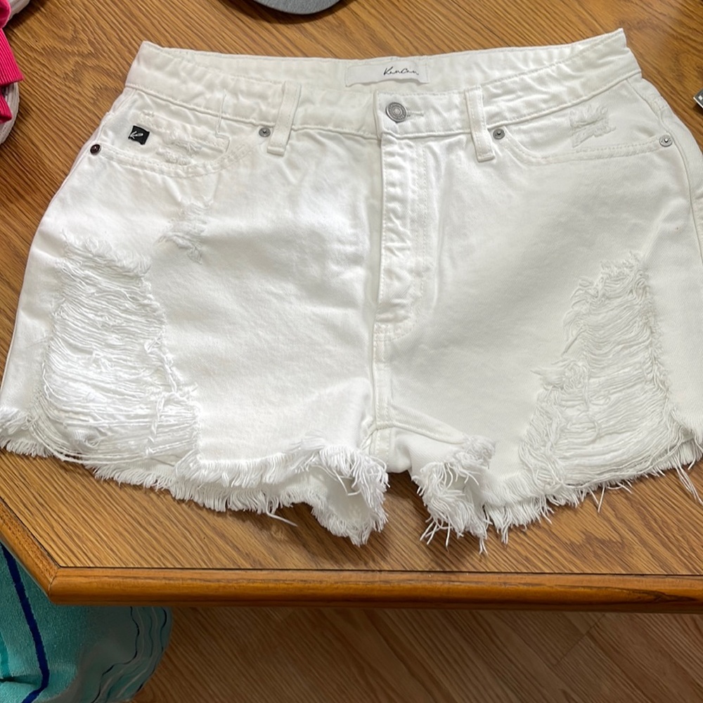 Kancan white distressed shorts.
